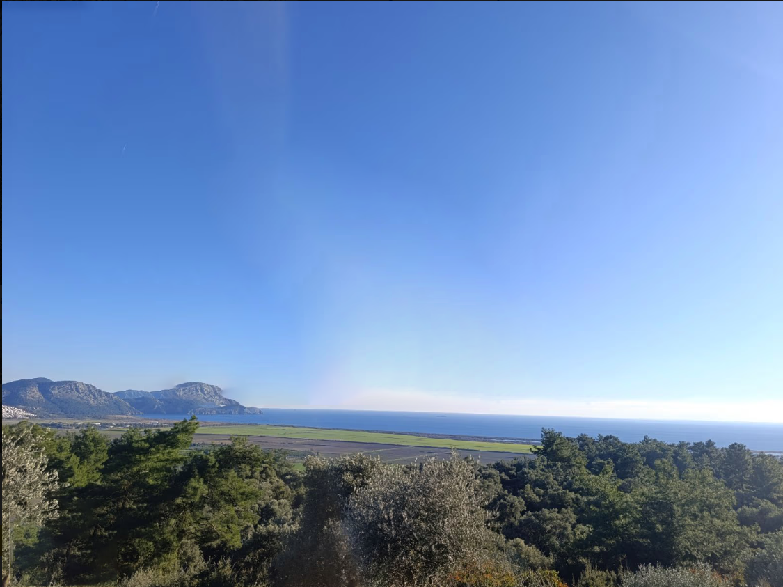 Ortaca Fevziye’de 9.695 m² Satılık Malikanelik Arsa | Full Deniz Manzaralı | 150 m² İnşaat İzinli